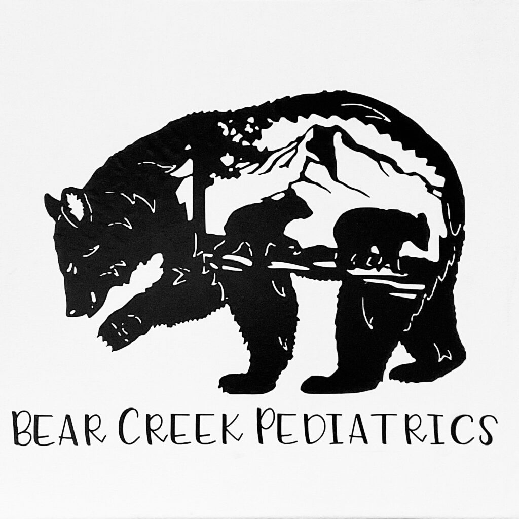 A black and white print of an illustrated bear with the text "bear creek pediatrics" below it